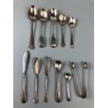 Collection of various silver flatware to include spoons knives sugar nips (11 pieces)approx 212 g