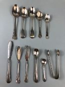 Collection of various silver flatware to include spoons knives sugar nips (11 pieces)approx 212 g