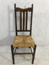 Antique furniture, High slat back bobbin chair with rush seat possibly Scottish approximately