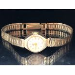 9ct Gold watch by Swiss Empress on a 9ct Gold strap with a 21 Jewel Incabloc movement, total