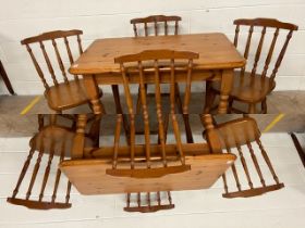 Pine table and four chairs, table approx 107cm x 70cm x 74cm