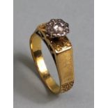 18ct Gold ring set with a single Diamond approx size 'N' in heart shaped box