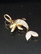 9ct Gold Dolphin pendant set with Diamonds approx 20mm x 14mm