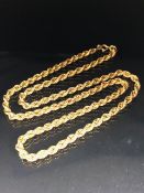 9ct Gold chain of rope link design marked 375 approx 60cm long and total weight approx 10.9g