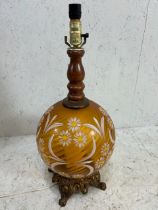 European twisted amber glass table lamp decorated with painted daisys