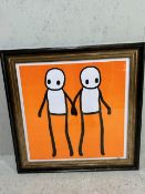 Pop art framed print of of 2 drawn figures on an orange background, approximately 84 x 84cm