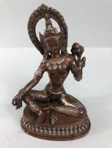 Oriental Interest, Tibetan, 2 colour metal statue of the Green Tara, sealed base possibly containing
