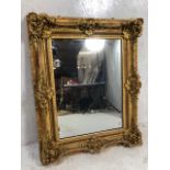 Antique French ornate gilt framed mirror, glass with foxing, approx 79cm x 98cm