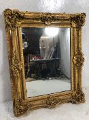 Antique French ornate gilt framed mirror, glass with foxing, approx 79cm x 98cm
