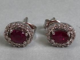 Ruby and Diamond Stud earrings set in 9ct white Gold