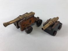 Military Interest, two early 19th century gaming Cannons, one continental with engraved brass barrel
