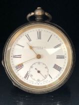 Freeman & Co London Silver pocket watch with Gold coloured hands and Roman numerals, stamped 925