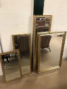 Collection of four bevel edged gold framed mirrors