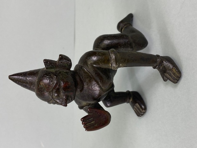 Antique Indian Bronze Hindu Figure of Krishna crawling as a child approximately 11cm high