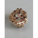 9ct gold hand crafted dandelion ring set with Garnets size approximately L and 7.81g inclusive