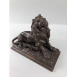 Antique Metal ink and pen stand fashioned as a Lion , the lifted head revealing ink pot,