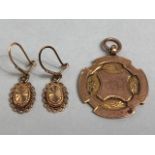 9ct Gold Medallion and a pair of 9ct gold earrings total 6.7g