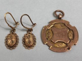 9ct Gold Medallion and a pair of 9ct gold earrings total 6.7g