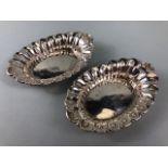 Pair of Edwardian Hallmarked Silver dishes with repoussé decoration hallmarked for Sheffield by