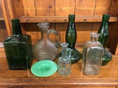 Collection of glassware to include a large Squires Gin bottle