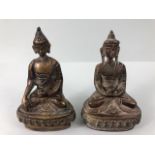 oriental interest , two patinated Tibetan brass Buddha statues the bases still containing casting