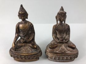 oriental interest , two patinated Tibetan brass Buddha statues the bases still containing casting
