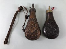 Military interest, 2 black powder flasks, both embossed with American symbolism
