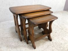 Nest of three Ercol tables the largest 57cm x 35cm x 42cm