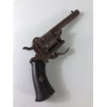 Antique guns, antique Belgian rim fire pocket revolver of obsolete caliber, wooden grips and folding