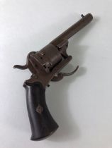 Antique guns, antique Belgian rim fire pocket revolver of obsolete caliber, wooden grips and folding