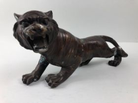 Patinated Brass sculpted figure of a roaring Tiger approximately 29cm in length