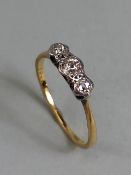 18ct Gold three stone Diamond ring size approx 'O'