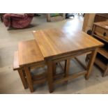 Modern light oak nest of three stacking tables. Approx 60 x 60 x 56cm