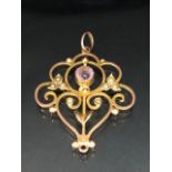 9ct Gold Brooch set with seed pearls and a light purple Amethyst approx 37 x 30mm & 2.8g