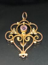 9ct Gold Brooch set with seed pearls and a light purple Amethyst approx 37 x 30mm & 2.8g