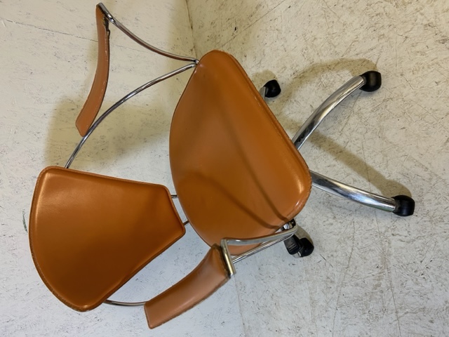 Mid century Style upholstered and chrome framed office chair on casters