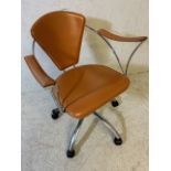 Mid century Style upholstered and chrome framed office chair on casters