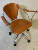 Mid century Style upholstered and chrome framed office chair on casters