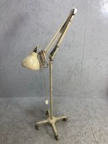 Vintage angle poise style metal lamp on castors