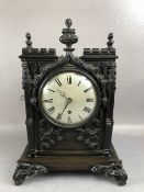 Cathedral Clock, patinated metal cased Cathedral clock, silvered face with roman numerals compleat