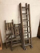 Collection of various sizes of wooden vintage ladders