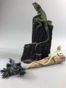 pottery sculptures, three ceramic studies of lizards one naturalistic of an iguana on a rock