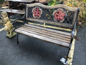 Wooden and metal framed garden bench