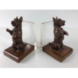 Pair of vintage cast Bronze bookends depicting Scotty dogs/ Scottish Terriers sat on wooden