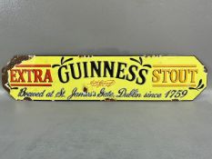 Advertising sign. Metal and enamel sign for Guinness stout approximately 47 x 13 cm