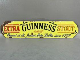 Advertising sign. Metal and enamel sign for Guinness stout approximately 47 x 13 cm