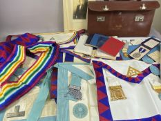 Masonic interest, a collection of Masonic regalia to include several lodge aprons , leather case,