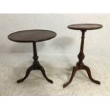 Two circular side table or wine tables each on out-splayed tripod feet, the largest, approx 65cm