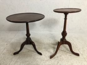 Two circular side table or wine tables each on out-splayed tripod feet, the largest, approx 65cm