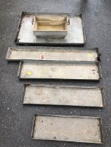 Collection of galvanised metalwork items to include five various trays and a two handled trug